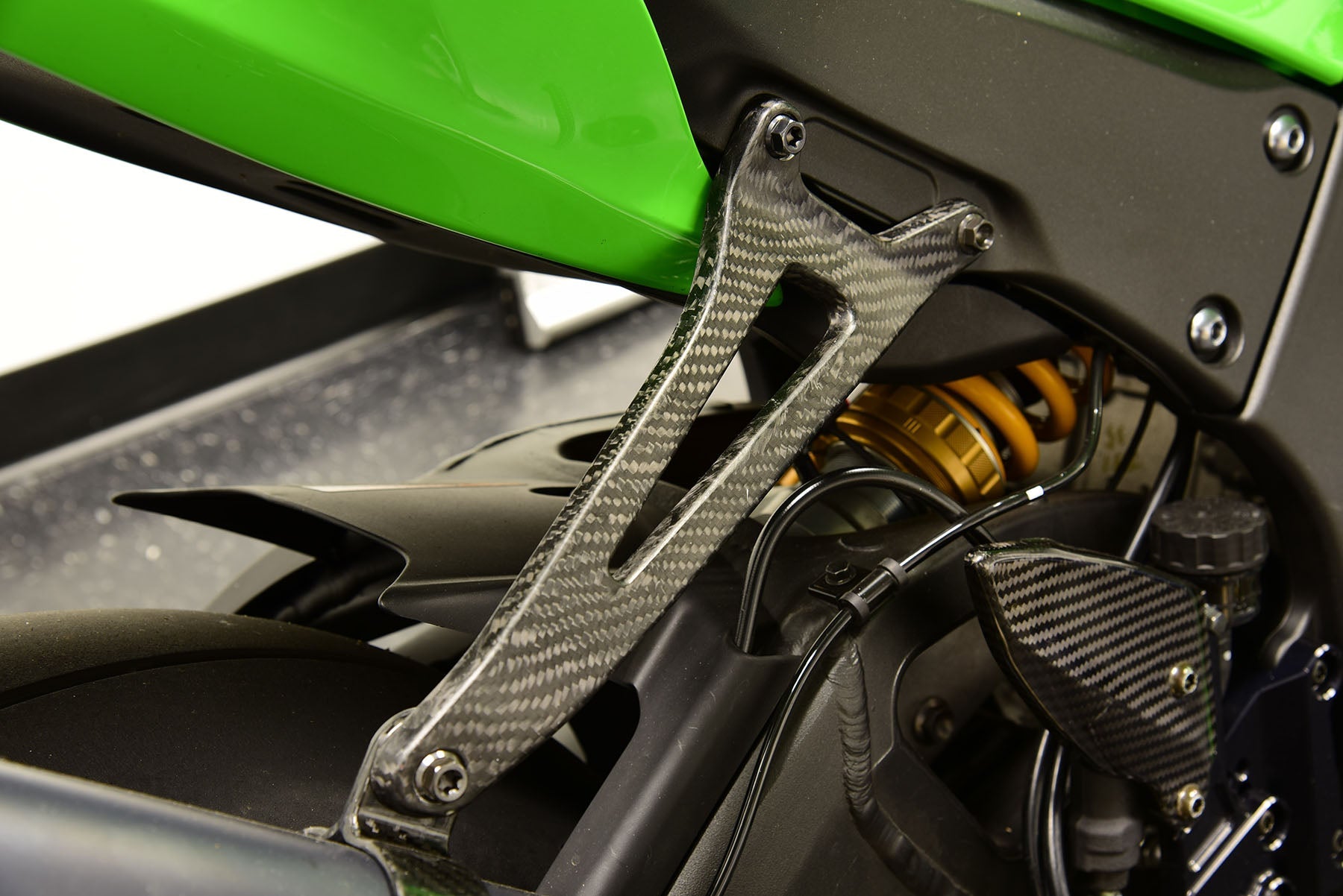 Carbon Fiber Exhaust Hanger Bracket - ZX-10R / ZX-6R